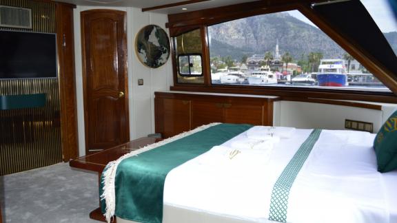 From Ayem’s cabin in Göcek, enjoy stunning views of the marina and surrounding hills.