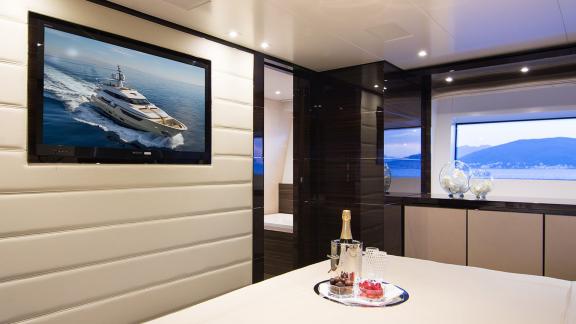 High-quality amenities in the master cabin on Souraya with panoramic views and entertainment system.