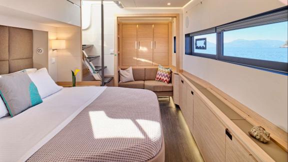 The luxury cabin of the Sunmoon yacht offers comfort and elegance with its modern design and sea view.