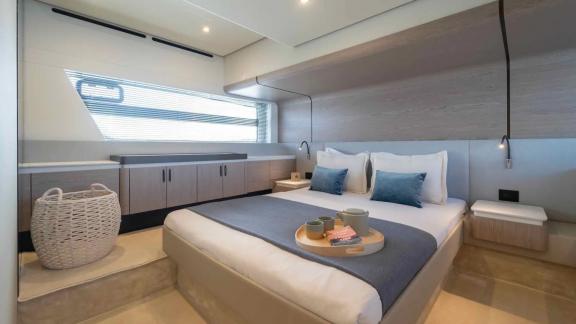Spacious double bed, modern design, and generous storage create a cozy, bright retreat.