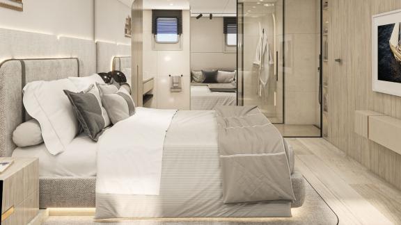 Spacious cabin with a large bed, modern furniture, and en-suite bathroom on a yacht.