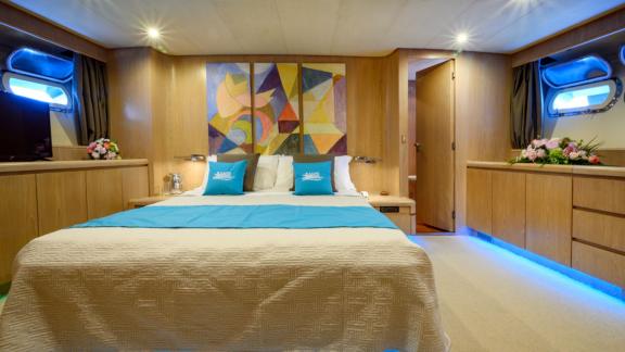 Relax in the comfortable master suite of Sandi IV and discover the luxury of an Italy motor yacht rental.