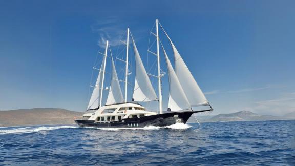 The elegant Meira sailing yacht cruising near the stunning coast of Bodrum.