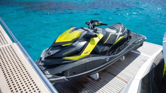 The jet ski on Midnight Summer Dream yacht is ready for the sea.