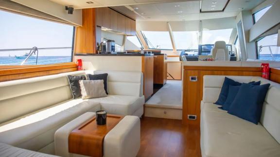 Stylish interior design with comfortable seating areas on the Midnight Summer Dream yacht.