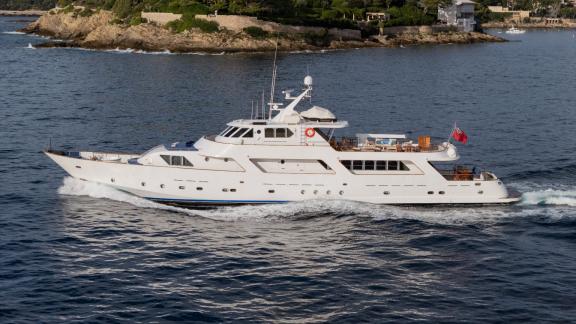 Among Cannes daily yacht rental options Ava motor yacht is seen cruising from close side view at sea.