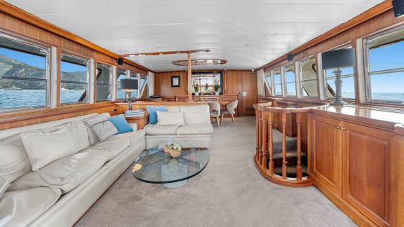 Among Cannes daily yacht rental options Ava motor yacht interior shows large seating area and comfort.