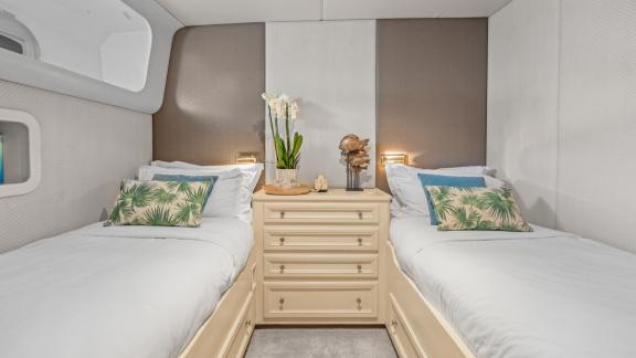 Among Cannes daily yacht rental options Ava motor yacht cabin shows twin beds for comfortable stay.