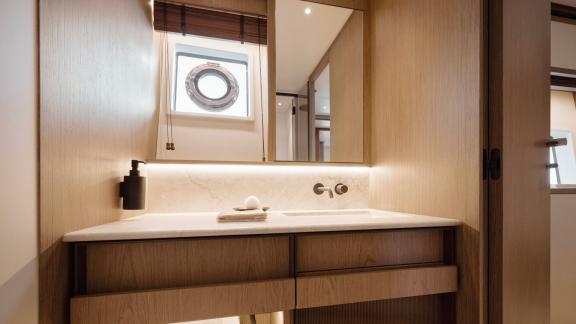 In Sibenik motor yacht charter option Balance bathroom with sink mirror and elegant modern interior offering comfort vis