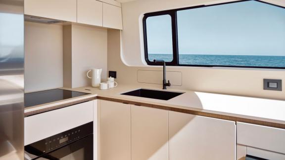 In Sibenik motor yacht charter option Balance kitchen with modern equipment and sea view offering practical use visible.