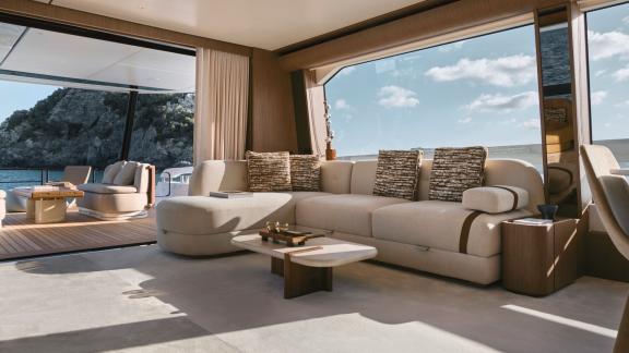 In Sibenik motor yacht charter option Balance salon with large sofas and panoramic sea view offering luxury comfort visi