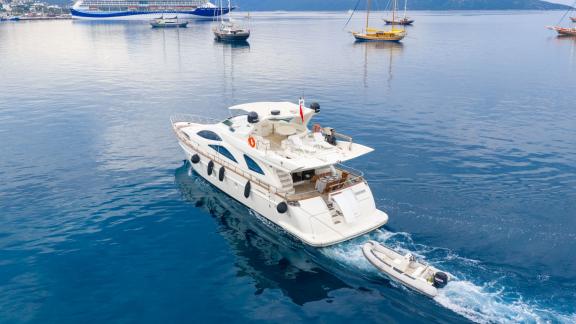 Barans offers private motor yacht charters and VIP sea holidays in Bodrum from an aerial stern view.