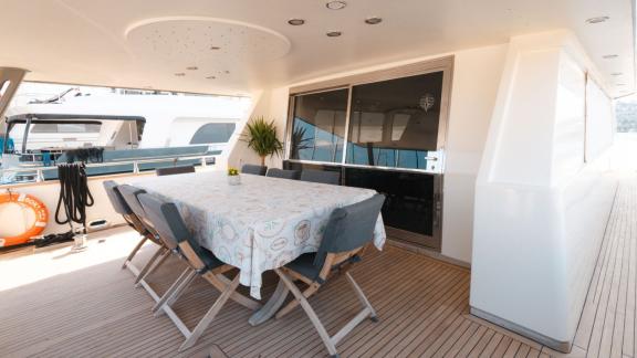 Bona Dea motor yacht in Gocek offers an aft deck dining space for enjoyable meals with sea views.