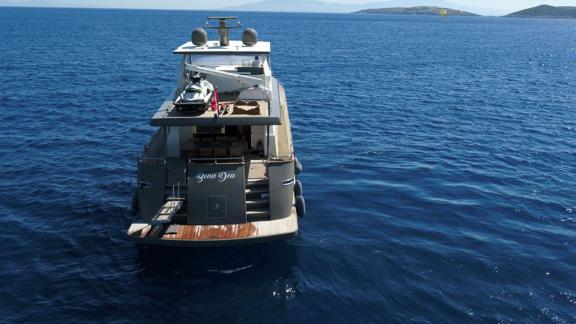 Bona Dea motor yacht in Gocek features a spacious stern platform and open air leisure areas for guests.