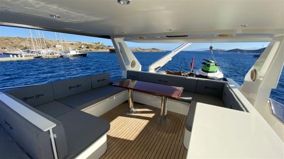 Bona Dea motor yacht in Gocek offers a comfortable upper deck lounge for relaxing and enjoying the surroundings.