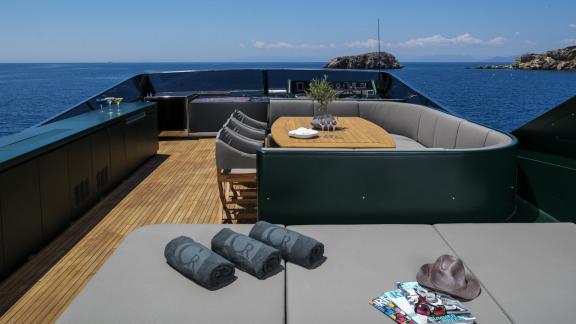 Enjoy the cozy lounge on the 35m motor yacht in Mykonos.