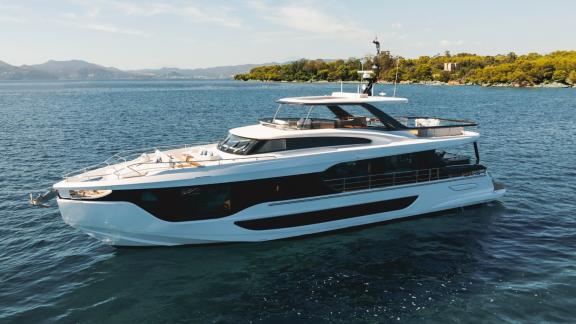 In Sibenik motor yacht charter option First Horizon cruising at sea with modern design and spacious deck.