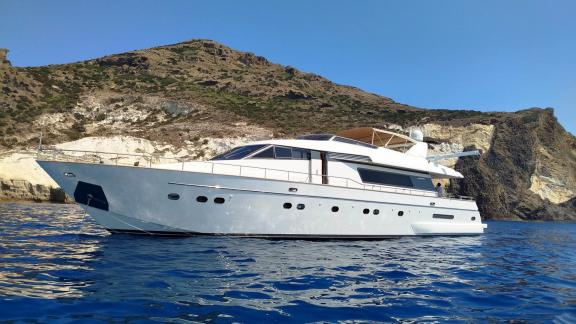 Mammas motor yacht cruising near Athens coast. 4 cabins offer comfortable yacht charter experience for 8 guests.