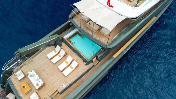 In Spain weekly yacht rental options Moka shows deck pool and relaxation space.
