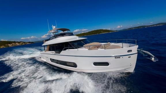 Olivia cuts through the waves with elegance on the blue waters of the Adriatic Sea.