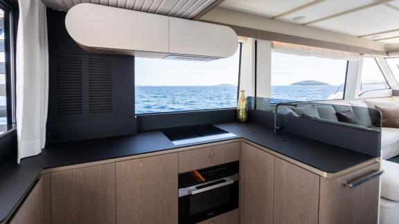 Sleek cooking space with Adriatic views, perfect for onboard meal prep.