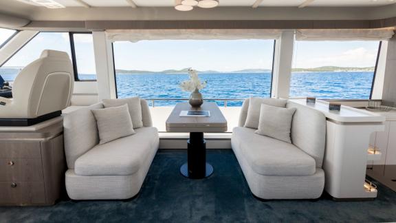 Relax in plush seating and enjoy stunning Adriatic views on the Olivia motor yacht in Šibenik.