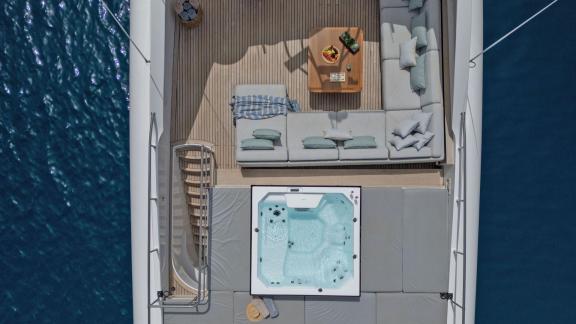 Anchored in Athens, the upper deck features a jacuzzi, large sunpads and a cozy corner sofa.