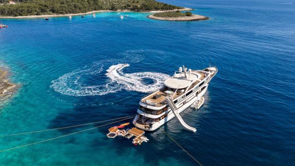 Premier motor yacht in Split featuring a sea platform, water toys and family friendly yacht charter experiences.