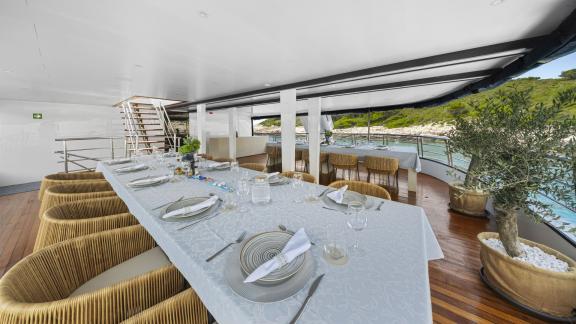 Dining area on the Premier motor yacht in Split, combining gourmet meals with breathtaking sea views.
