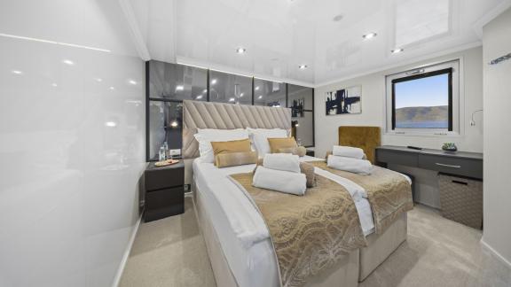Double cabin on the Premier motor yacht in Split, featuring elegant interiors and spacious accommodation for guests.
