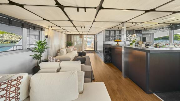 Bar and lounge area on the Premier motor yacht in Split, offering a refined setting for relaxation and social gatherings