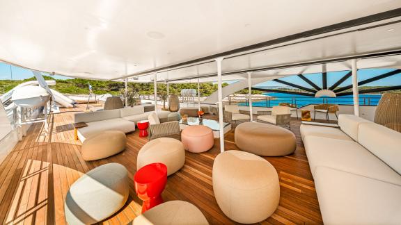 Panoramic lounge deck on the Premier motor yacht in Split, designed for socializing, relaxation and sunset cocktails.