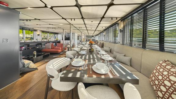 Indoor dining saloon of the Premier motor yacht in Split, designed for private dinners and gourmet experiences at sea.