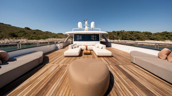 Upper deck of the Premier motor yacht in Split, designed for sunbathing, relaxation and panoramic sea views.