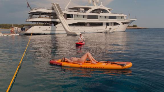 Premier motor yacht in Split, featuring water toys and sea activities for unforgettable yacht charter holidays.