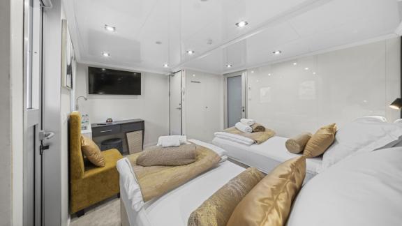 Triple guest cabin on the Premier motor yacht in Split, ideal for families and small groups enjoying a luxury yacht holi