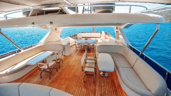 Among Göcek yacht charter options the 5 cabin 10 guest River Storm motor yacht features a spacious flybridge lounge.