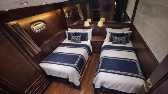 Among Göcek yacht charter options the 5 cabin 10 guest River Storm motor yacht features a twin cabin with two separate b