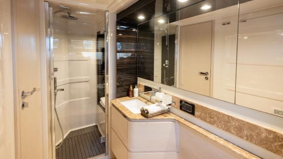 Sea Ya features a modern guest bathroom with a spacious shower, adding comfort to the luxury yacht charter experience.