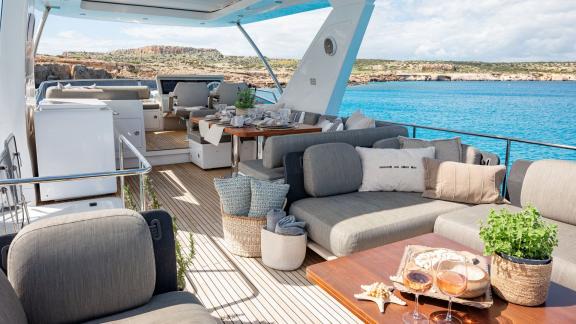 Sea Ya features a spacious flybridge lounge with sea views, ideal for a luxury yacht charter experience in Athens.