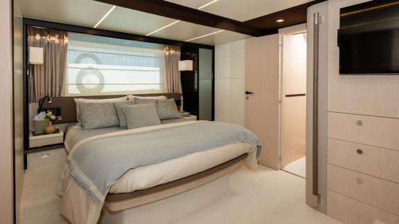 Sea Ya features a spacious master cabin with a modern design, offering premium comfort for yacht charter guests.