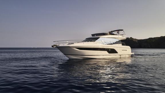 The motor yacht Shaft is pictured cruising near Split at sunset.