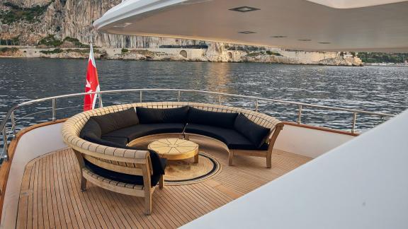 Among motor yacht rental options in Athens Sounion II aft deck round seating area with table is seen.