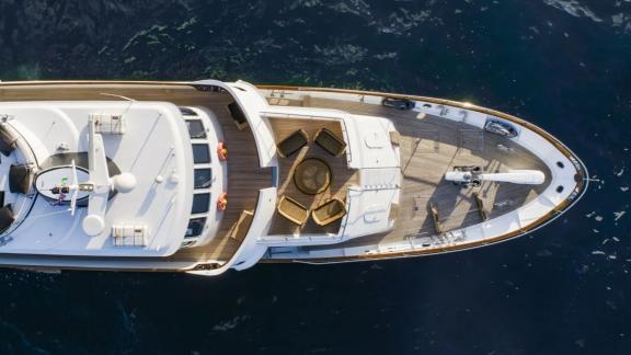 Among motor yacht rental options in Athens Sounion II is seen from above with front deck seating area.