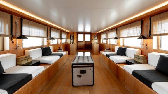 Among motor yacht rental options in Athens Sounion II interior lounge with seating areas offers a spacious onboard space