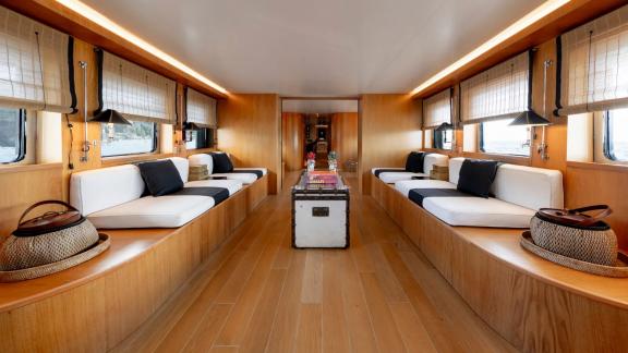 Among motor yacht rental options in Athens Sounion II interior lounge with seating areas offers a spacious onboard space