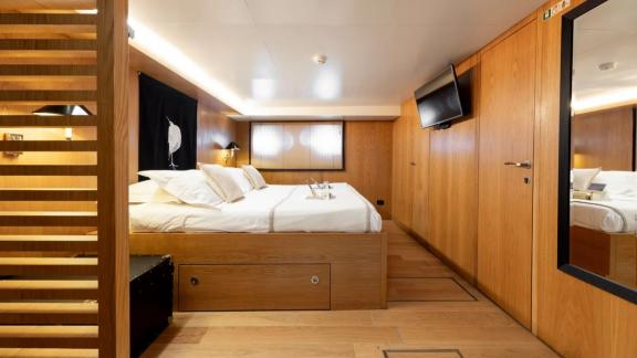 Among motor yacht rental options in Athens Sounion II cabin with bed and storage offers a clean and comfortable onboard