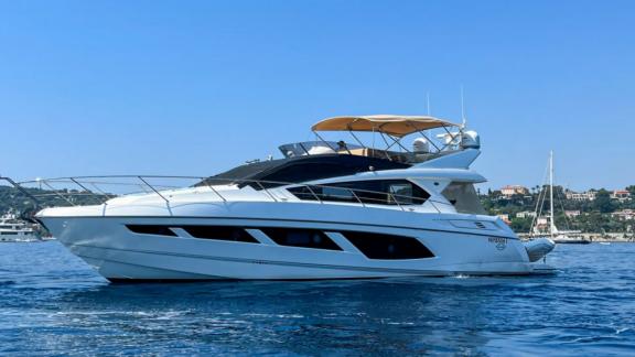 Among Nice yacht charter options Turquoise motor yacht shows smooth cruising and relaxing sea experience.