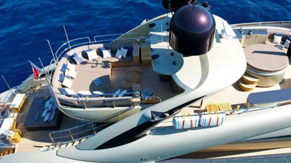 Among Mallorca yacht charter options Ycm120 shows upper deck lounge and sunbathing space.