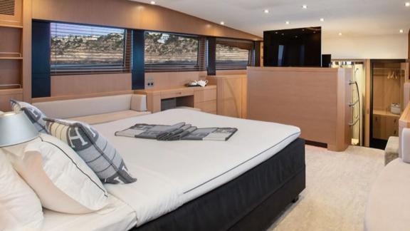 Among Mallorca yacht charter options Ycm120 shows large cabin and comfortable stay.